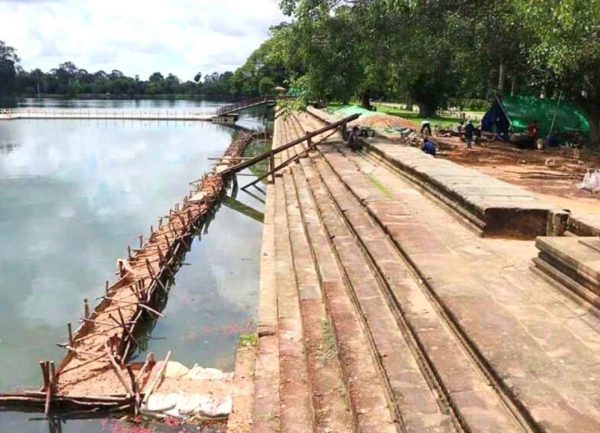 Stairs of the Angkor Moat are being repaired